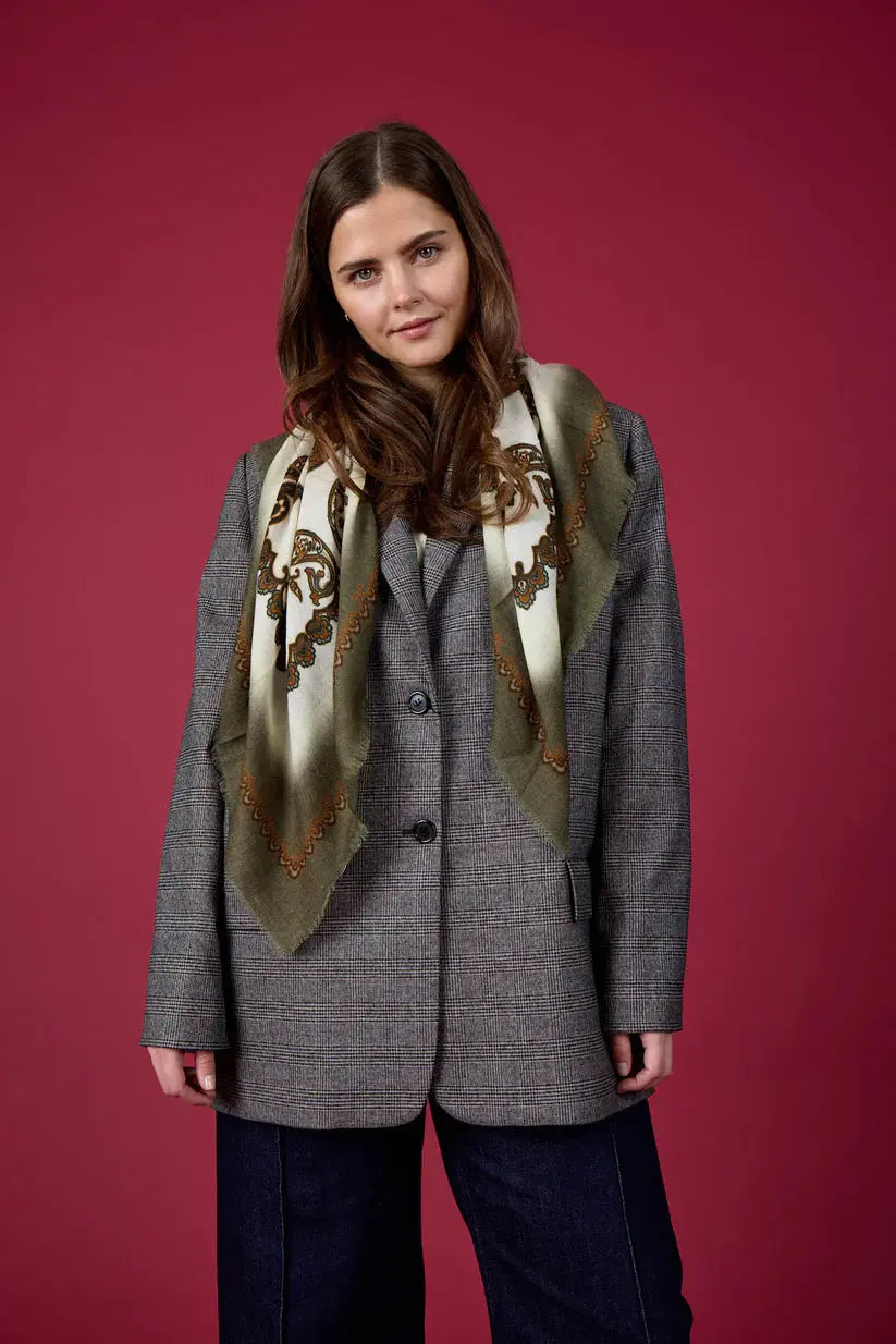 Model wearing Paisley pattern wool scarf